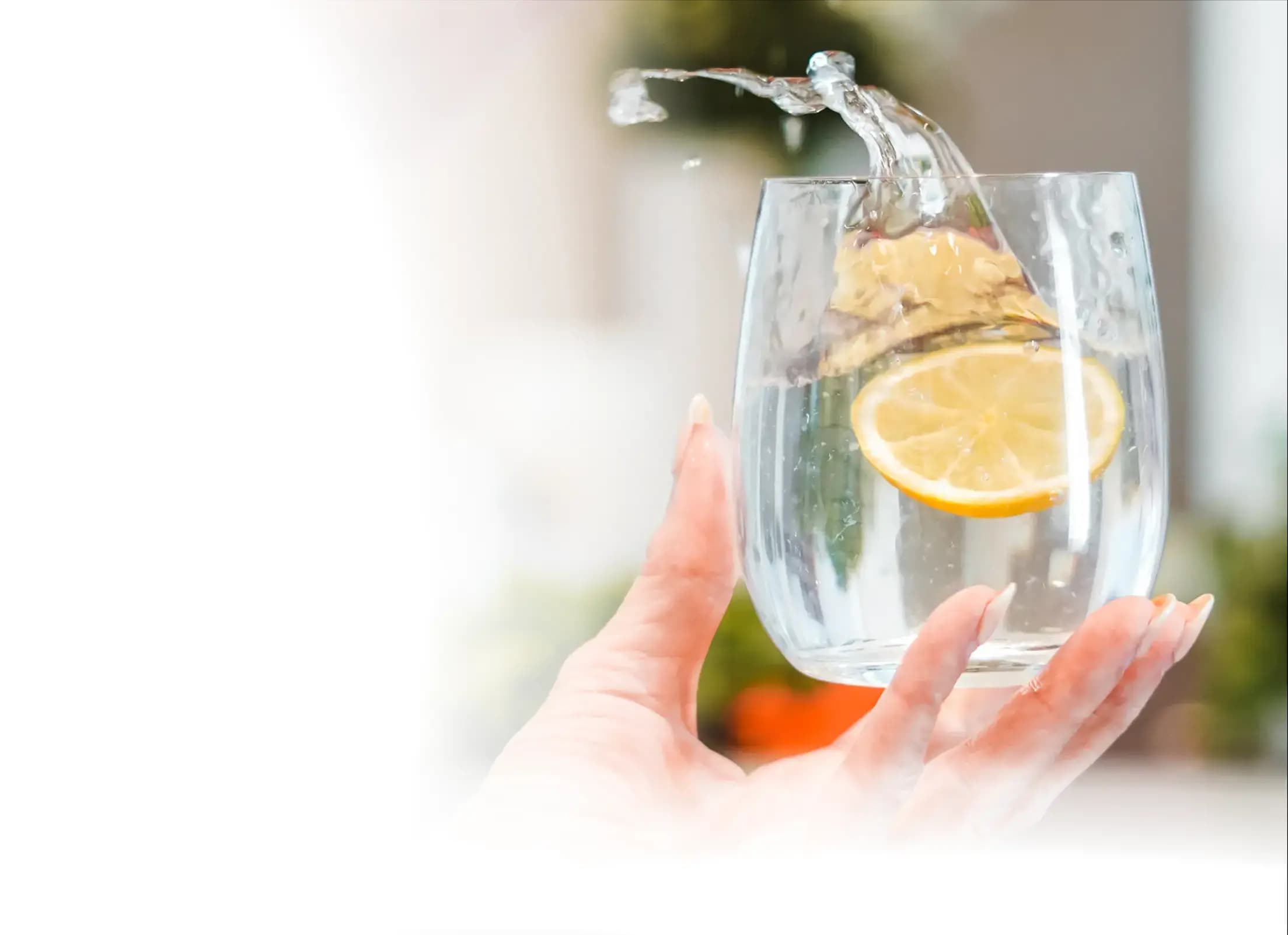 OneWater whole-home water filtration system installed in a modern Australian kitchen