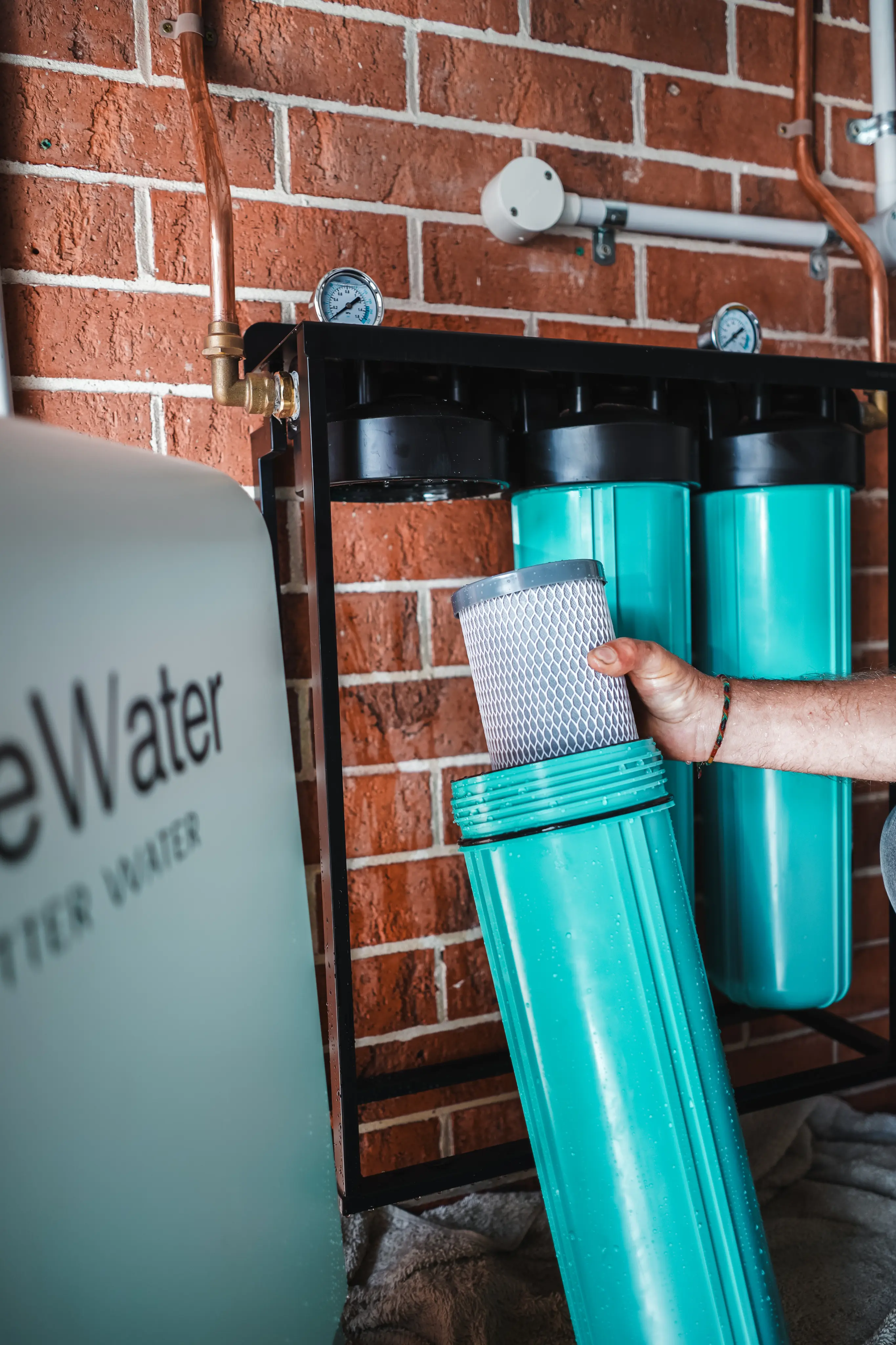 Family enjoying filtered water in a kitchen