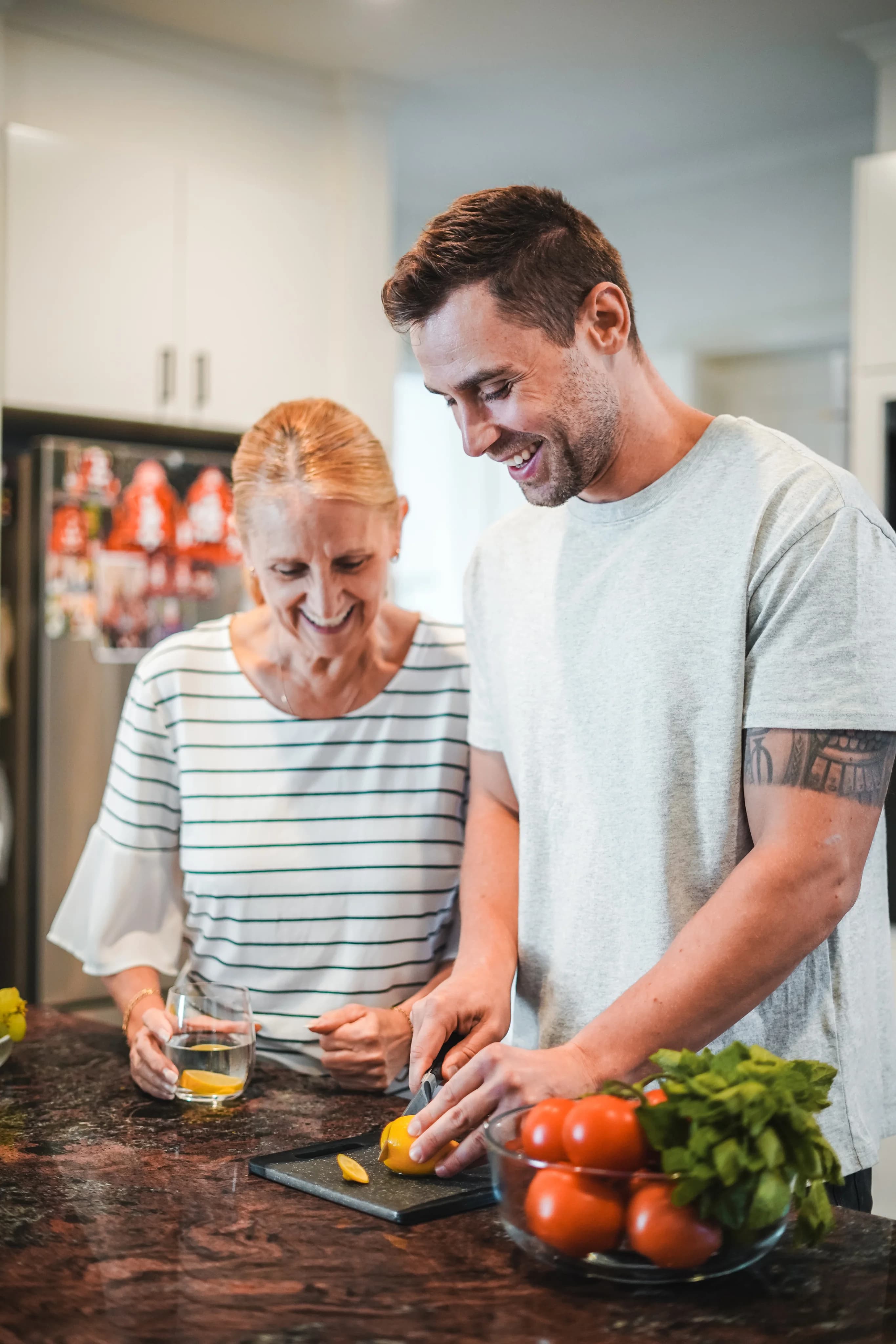 Family preparing food in kitchen